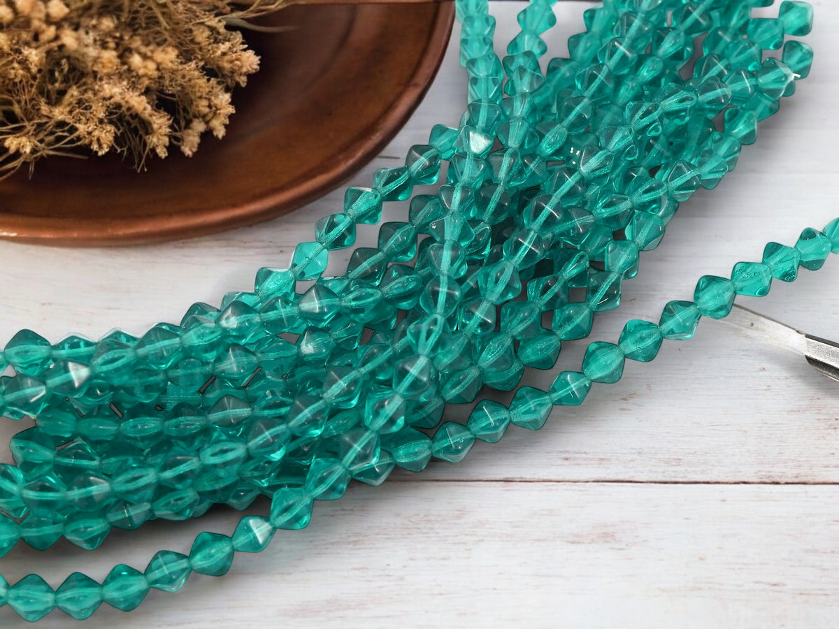 *25* 6mm Translucent Teal Lucerna Bicone Beads