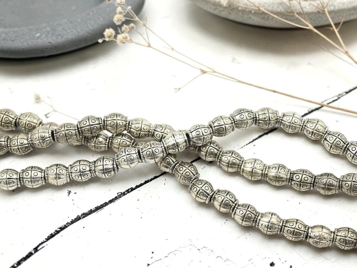 *27* 7x6mm Antique Silver Barrel Beads
