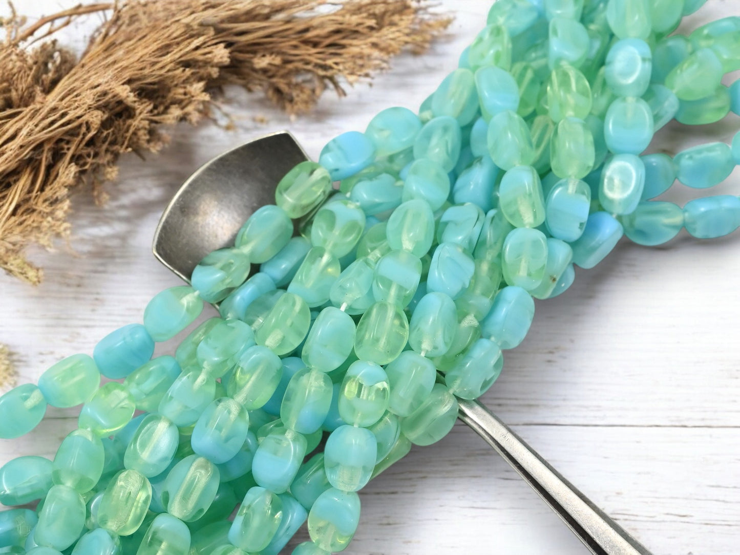 *25* 9x7mm Blended Blue Laguna Tri Oval Beads