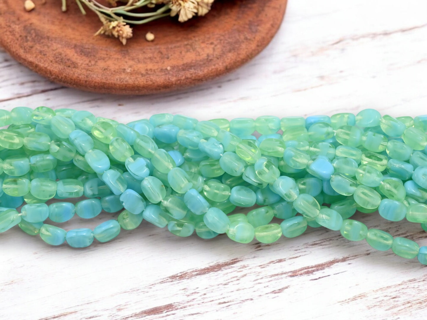 *25* 9x7mm Blended Blue Laguna Tri Oval Beads