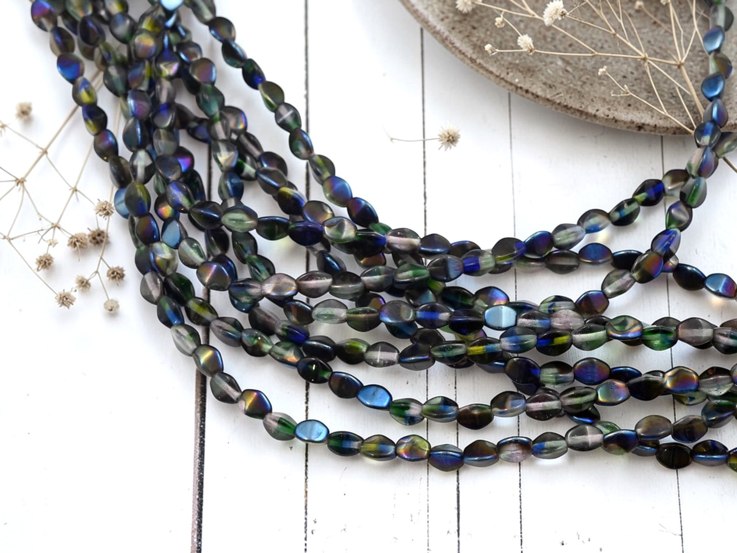 *40* 5x4mm Crystal Hurricane Blue Iris Pinch Beads