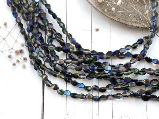 *40* 5x4mm Crystal Hurricane Blue Iris Pinch Beads