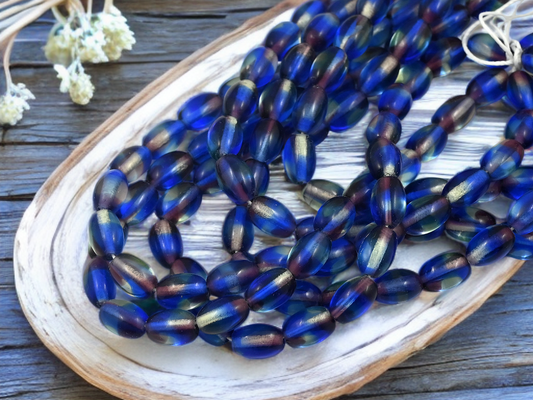 *25* 6x8mm Blended Sapphire, Amethyst + Jonquil Oval Rice Beads