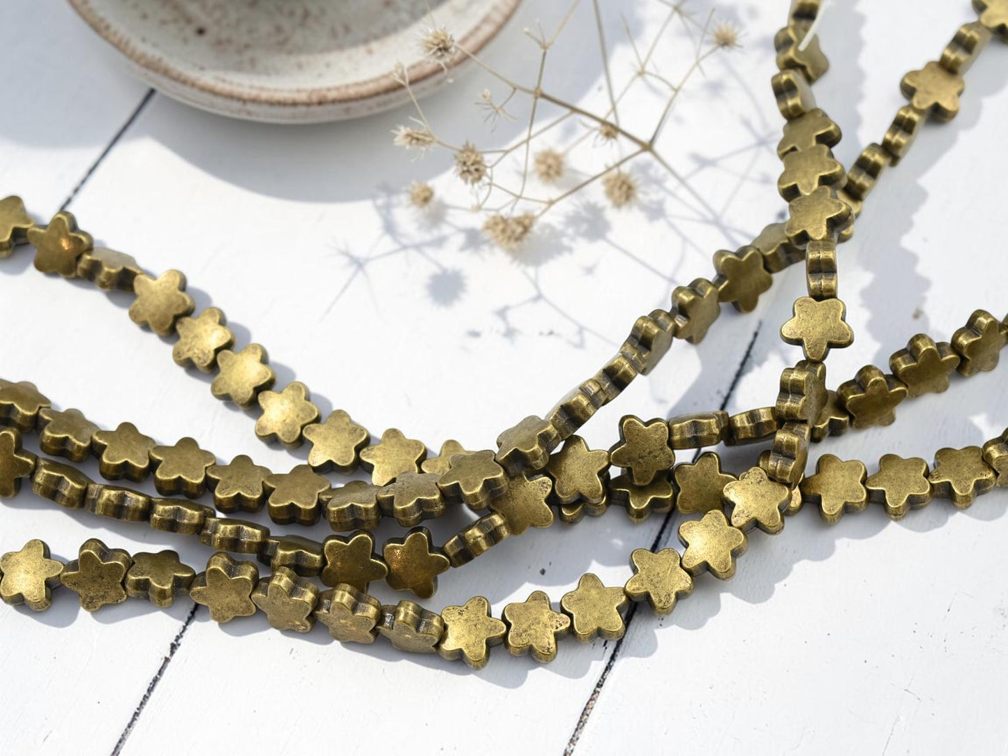 8mm Antique Bronze Flat Star Beads - 8" Strand
