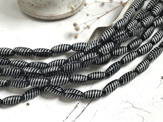 *14* 14x7mm White Washed Jet Black Oval Beads