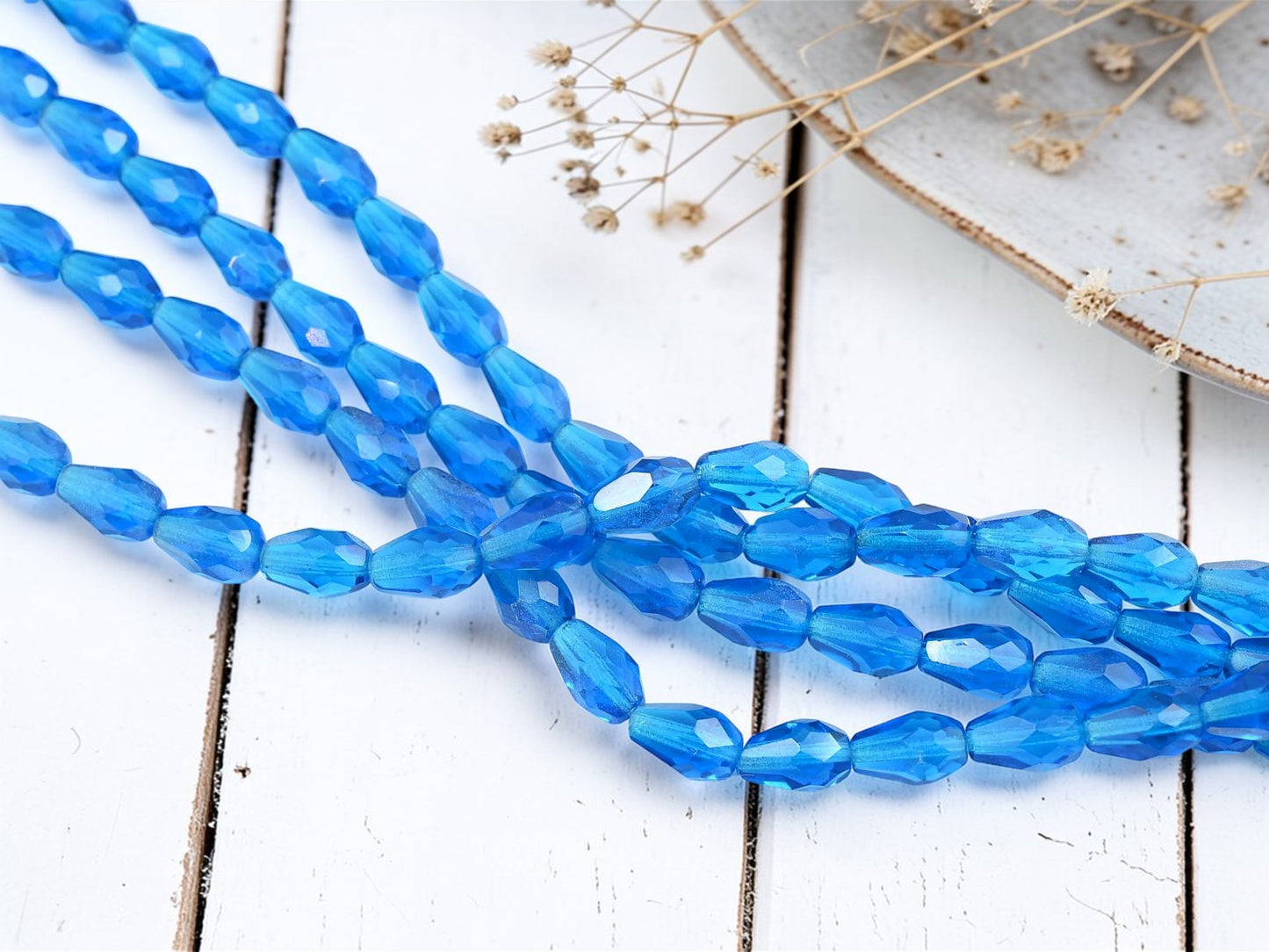 *20* 10x7mm Capri Blue Fire Polished Teardrop Beads