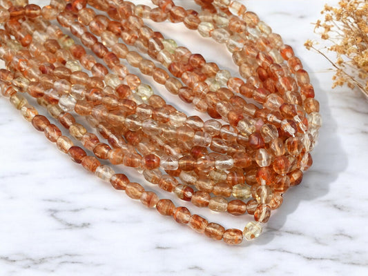 *50* 5x6mm Crimson Crystal Dented Round Beads