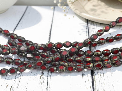 *18* 6x8mm Red Opaline Travertine 3 Sided Oval Beads