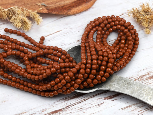 *100* 4mm Opaque Umber Round Druk Beads