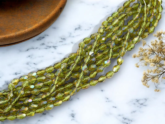 *50* 5x7mm Olive Celsian Fire Polished Oval Beads