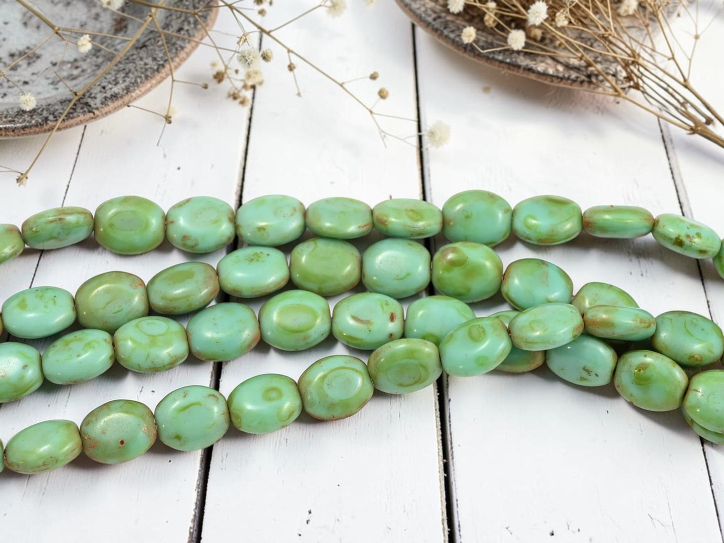 *17* 10x12mm Turquoise Picasso Oval Lentil Beads