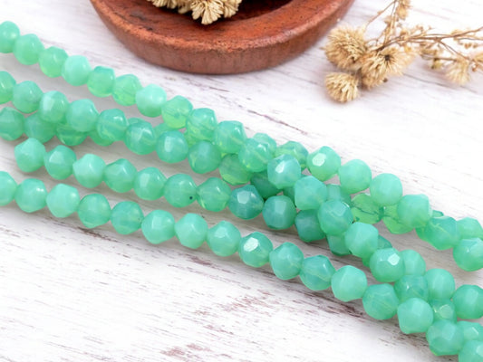 *23* 8mm Green Aqua Opaline Central Cut Round Beads