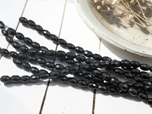 *18* 5x8mm Jet Black Fire Polished Oval Beads