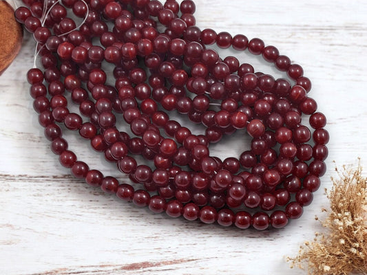 *50* 6mm Oxblood Red Round Druk Beads