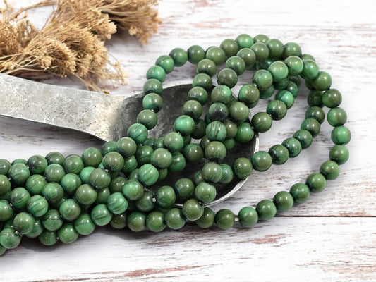 *75* 6mm Mottled Green Turquoise Picasso Round Druk Beads