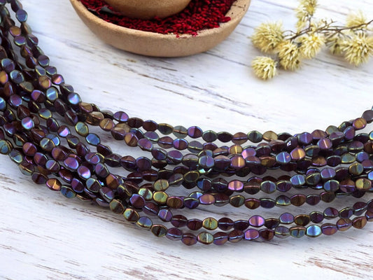 *42* 5x4mm Metallic Ruby AB Pinch Beads