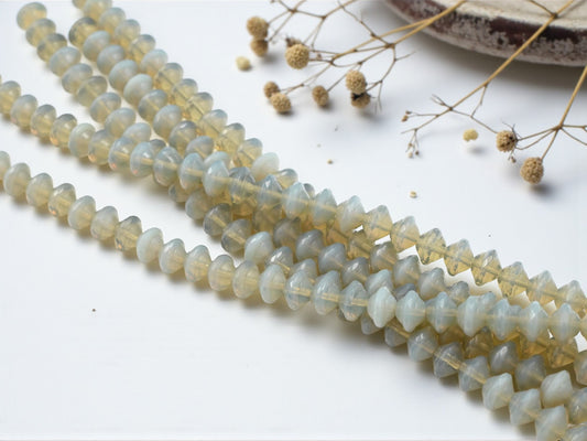 *29* 7x9mm Grey Opaline Saturn Beads
