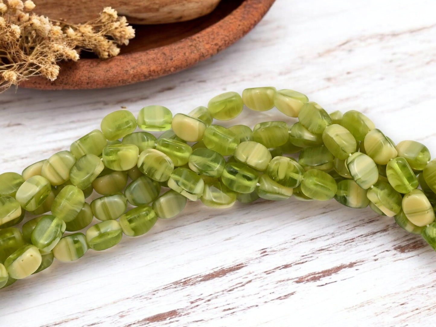 *25* 9x6mm Olivine Cream Tri Oval Beads