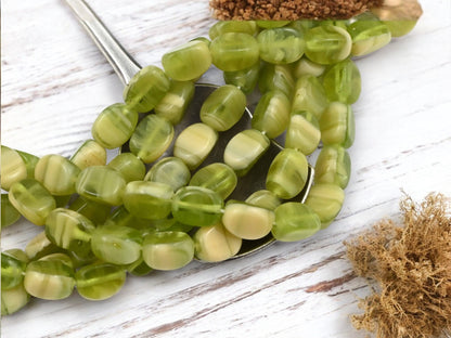 *25* 9x6mm Olivine Cream Tri Oval Beads