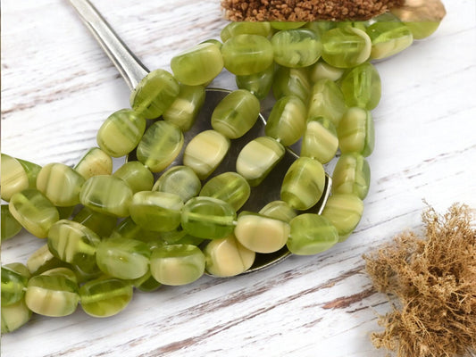 *25* 9x6mm Olivine Cream Tri Oval Beads