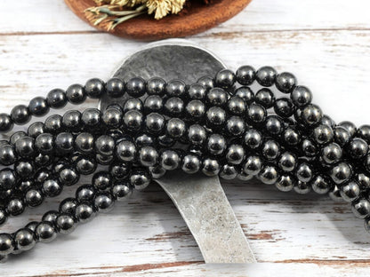 *50* 6mm Hematite Round Druk Beads